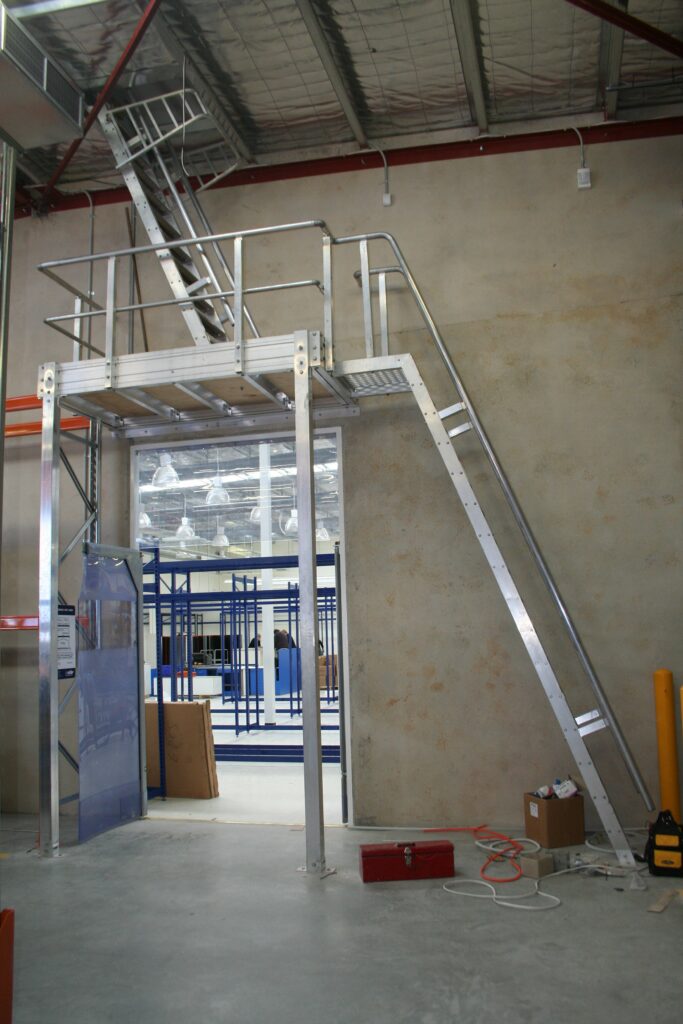 Access to roof using ladder and platforms