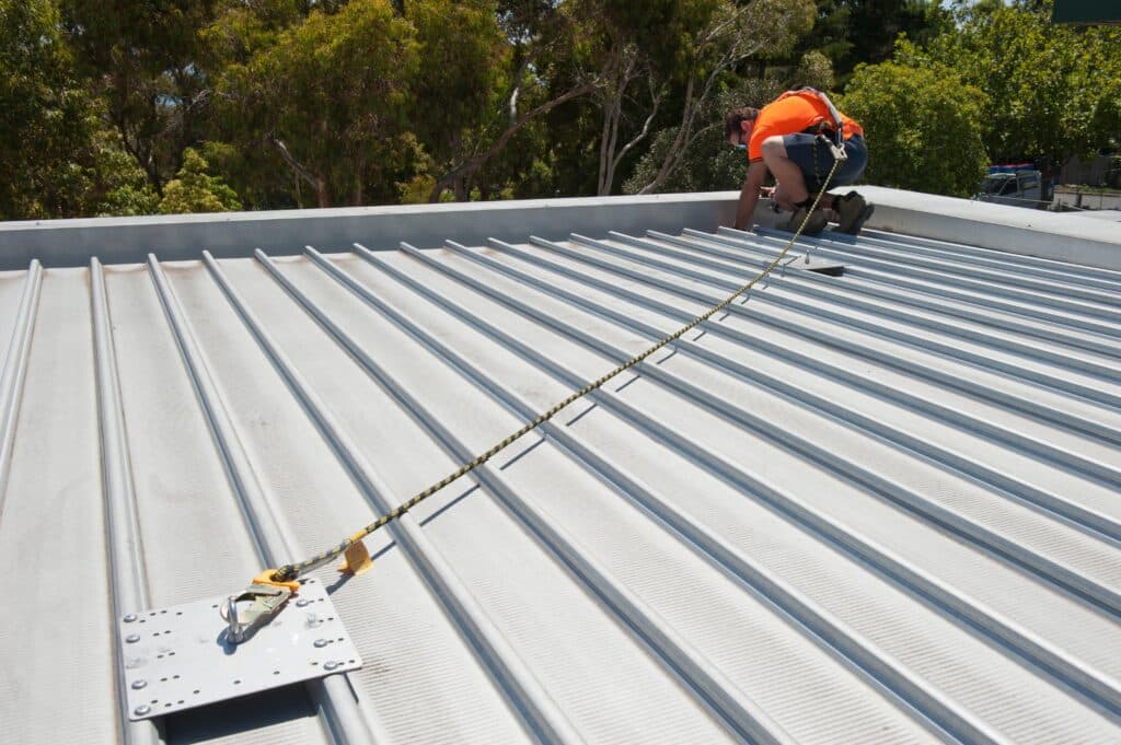 An height Safety inspector working on the roof